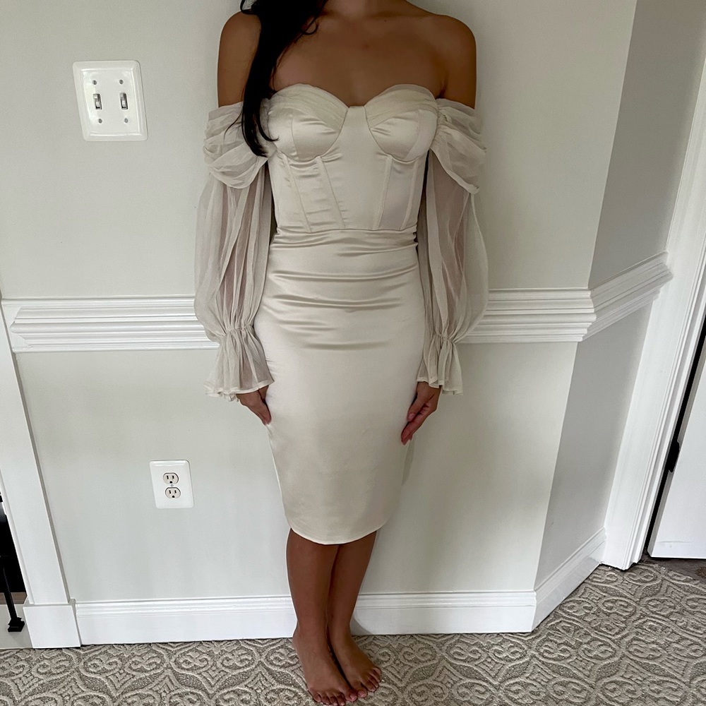 Cream Silk Miss Circle Dress with chiffon sleeves.